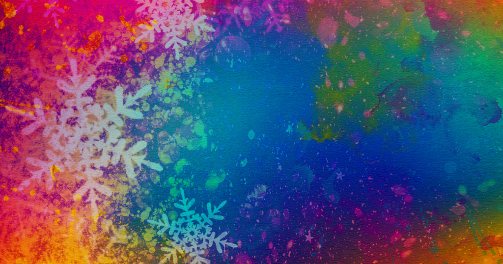 Stock artwork featuring areas of blending warm colours surrounding cool colours at the centre. On the left snowflake designs are on top of on the colours.